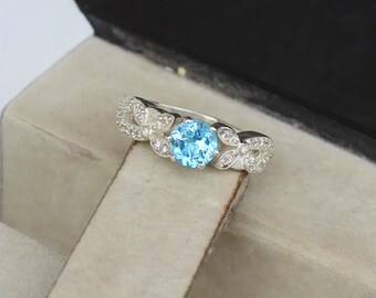 Swiss Blue Topaz Sterling Silver Ring – Round Gemstone, Cubic Zirconia Accents