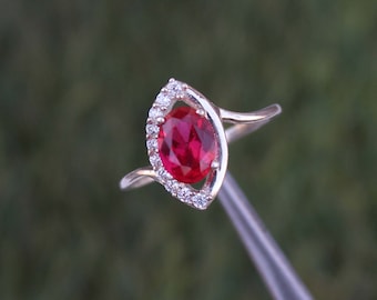 Anillo de rubí ovalado hecho a mano, plata de ley 925, halo de circonitas cúbicas.