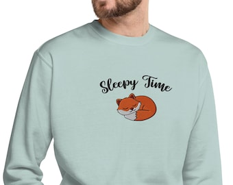 Sudadera unisex premium con estampado de zorro dormilón.