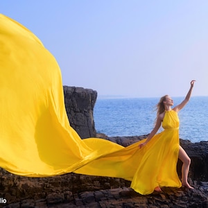 Yellow Satin Flying Dress: Halter Neck Long Train Photoshoot Gown