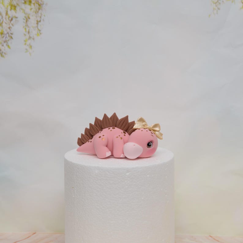 Baby Girl Dinosaur Cake Topper Made of Lightweight Air Dry Clay: Triceratops, T-rex, Brontosaurus, Stegosaurus, For Birthday Cake Pink Stegosaurus