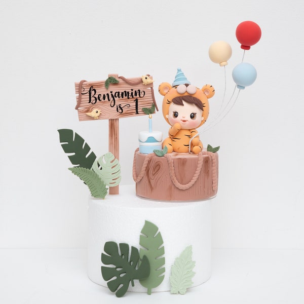 Baby tiger in bodysuit cake topper made of lightweight air dry clay for birthday, baby shower