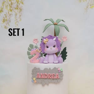 Baby Girl Dinosaur Cake Topper Made of Lightweight Air Dry Clay: Triceratops, T-rex, Brontosaurus, Stegosaurus, For Birthday Cake Set 1 w/Purple Trice