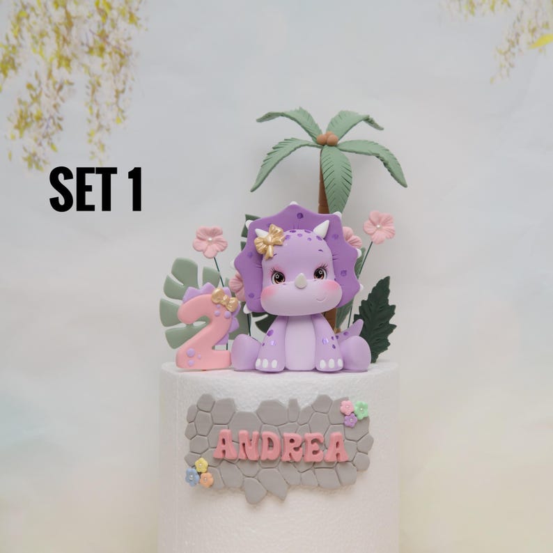 Baby Girl Dinosaur Cake Topper Made of Lightweight Air Dry Clay: Triceratops, T-rex, Brontosaurus, Stegosaurus, For Birthday Cake Set 1 w/Purple Trice