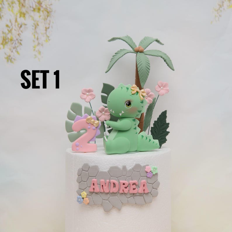 Baby Girl Dinosaur Cake Topper Made of Lightweight Air Dry Clay: Triceratops, T-rex, Brontosaurus, Stegosaurus, For Birthday Cake Set 1 w/ Green Trex