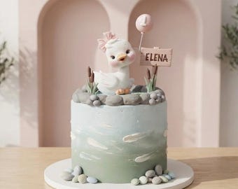Un adorno para pastel de ganso gracioso hecho de arcilla de espuma, para pastel de cumpleaños