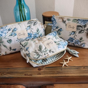 Set di pochette blu con motivo floreale, regalo per damigelle d'onore, trousse per il trucco giorno del matrimonio, organizer da viaggio