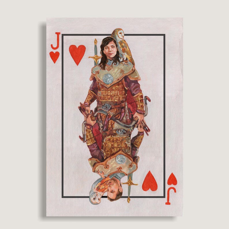 May include: A playing card featuring the Jack of Hearts. The illustration depicts a person in armor with a bow and arrow, a sword, and an owl perched on their shoulder. The card has a black border and the letter "J" and heart symbols in the corners.