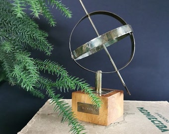 Vintage armillary sphere sundial. Made in Sweden. Home decor Book shelf decor. Made from brass an wood.