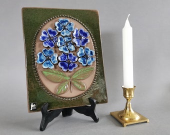 Vintage, ceramic wall decor with wild blue flowers by Aimo Nietosvuori for Jie Gantofta, Wall Plaque No. 847. Sweden studio pottery tile.