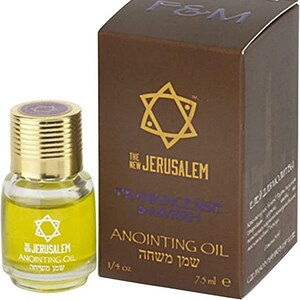 May include: A small bottle of Frankincense & Myrrh anointing oil with a gold cap and a star of David design. The bottle is labeled "The New Jerusalem Anointing Oil" and "שמן משחה". The bottle is packaged in a brown box with the same star of David design and the text "F&M The New Jerusalem Frankincense & Myrrh Anointing Oil" and "שמן משחה".
