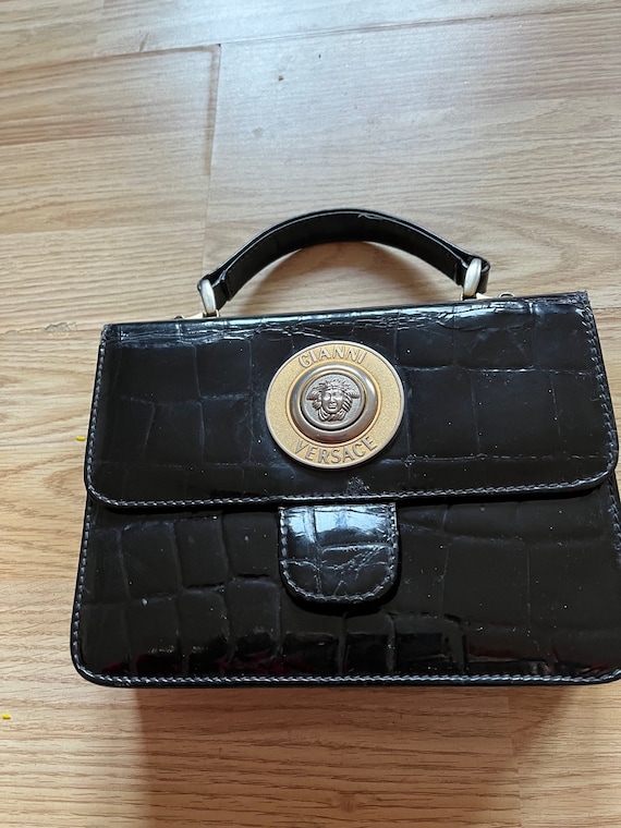 Versace handbag price sale