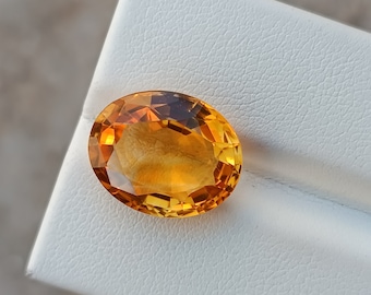 Naturalny cytryn: szlif owalny, fasetowany, luźny kamień 12x14x6 mm