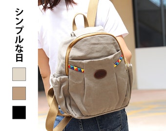 Sac à dos de femme quotidien d'école en toile coton biologique et fait main artisanal en style minimaliste japonais