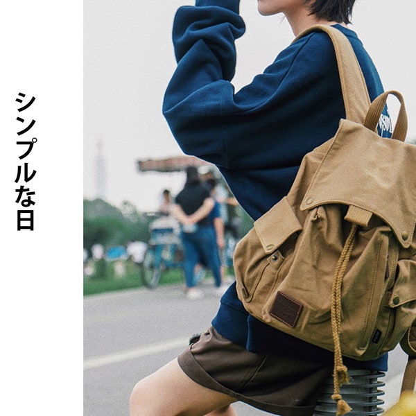 Women's travel backpack in organic cotton canvas and handmade in Japanese minimalist style