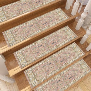 May include: Set of five pink and cream patterned stair treads with a floral design. The treads are made of a soft, durable material and are perfect for adding a touch of elegance to any staircase.