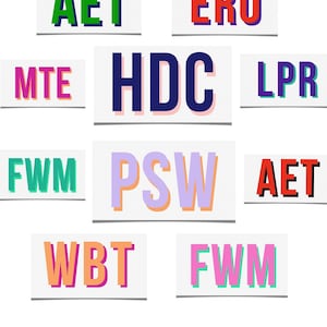 May include: Nine colorful paper squares with different three-letter acronyms written on them. The acronyms are: AET, ERO, HDC, LPR, FWM, PSW, AET, WBT, and FWM.