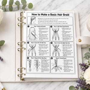May include: A white ring-bound planner containing an instructional page titled How to Make a Basic Hair Braid. The page features six numbered steps with black and white line drawings illustrating the process of braiding hair from start to finish.