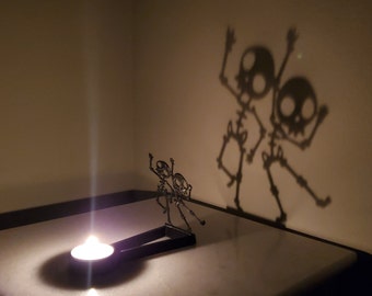 KeaLite Spooky Dancing Skeletons Caster (Tealight candles sold separately) *Buy Any 2 KeaLites & Get Free Shipping!*