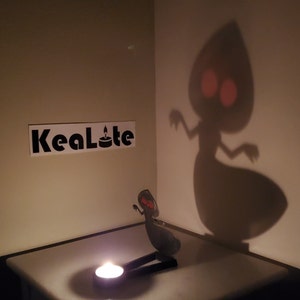 KeaLite Flatwoods Monster Shadow Caster -Eyes Actually Glow Red-(Tealight Candle Sold Separately) *Buy Any 2 KeaLites & Get Free Shipping!*