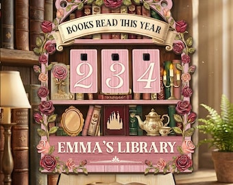 May include: A pink wooden bookshelf-style book tracker with the text "BOOKS READ THIS YEAR" and "EMMA'S LIBRARY". The tracker displays the number "234". The design includes rose and leaf accents, and a wooden stand.