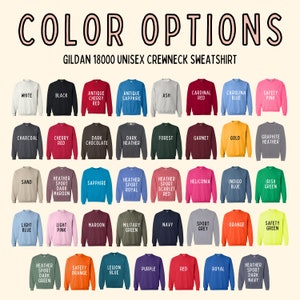 a bunch of sweaters that are all different colors