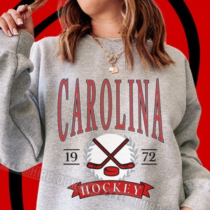 NHL, Tops, Lacedneckwomens Red Carolina Hurricanes Nhl Shield Hooded Hoodie  Sweatshirt