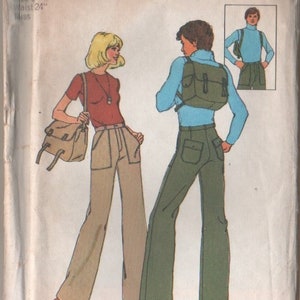 May include: Simplicity sewing pattern number 7164 for a pair of pants. The pattern includes instructions for making a pair of wide-legged pants for a woman and a pair of wide-legged pants for a man. The pattern is priced at $1.50.