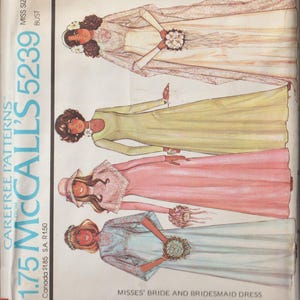 May include: A vintage sewing pattern for a bride and bridesmaid dress. The pattern is from McCall's and is number 5239. The pattern is for misses' sizes 10 to 32.