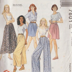 May include: A sewing pattern for a skirt and pants. The pattern is called "2 Hour Skirt & Pants" and "La Jupe/Le Pantalon en 2 Heures". The pattern is for sizes 10, 12, and 20. The pattern is from McCall's.