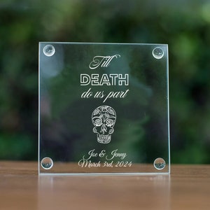 May include: Glass coaster with a white sugar skull design and the text "Till Death do us part" with the names "Joe & Jenny" and the date "March 3rd, 2024".