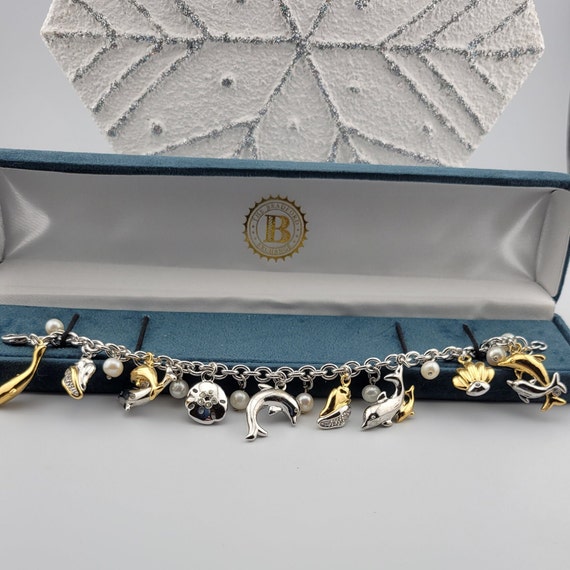 Juicy Couture Charm Bracelet Original Box Packaging Eight Silvertone Charms  Vintage Costume Jewelry 