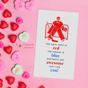 Image is a set of 3x5 hockey valentines day cards. The graphics are hockey related and in blue and red. The text has a hockey themed greeting and the text is also in blue and red. By Titles and Jotters