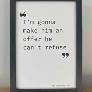 May include: Black and white framed print with the quote "I'm gonna make him an offer he can't refuse."  The Godfather, 1972.