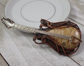 Gorgeous Wire Wrapped Fossilized Palm Root Guitar - Crystal Teardrop Cabochon - Silver Copper Wrapped Pendant - 4 Inch Guitar #PNDNT#1058