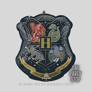 May include: A 22-inch black and gold foil balloon featuring the Hogwarts crest from the Harry Potter series. The crest includes a lion, eagle, badger, and snake, along with the Hogwarts motto "Draco Dormiens Nunquam Titillandus" and the letter "H".