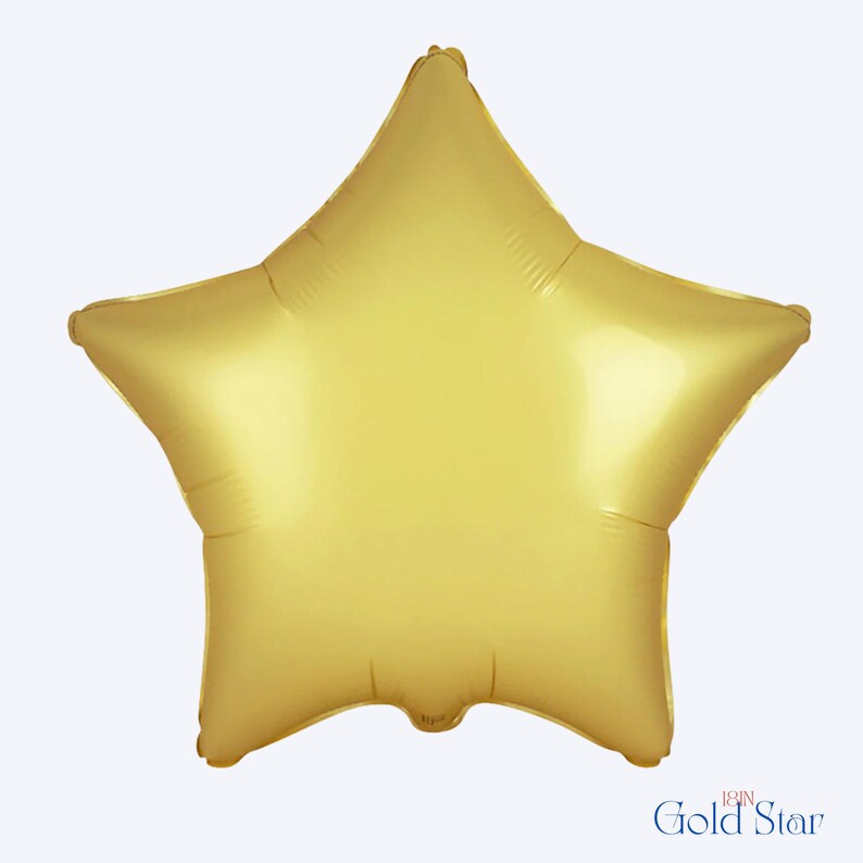 May include: A star-shaped foil balloon with a metallic gold finish. The balloon features a smooth, reflective surface and five distinct points. Printed text at the bottom right corner reads 18IN Gold Star, indicating a size of 18 inches.