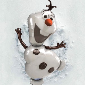 May include: A silver Olaf balloon from the movie Frozen. The balloon features a smiling face with a carrot nose, black eyes, and brown twig arms and hair. The balloon is on a white background.