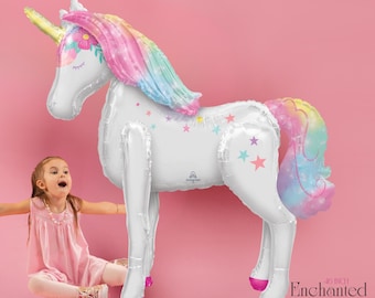 May include: A large white unicorn balloon with a rainbow mane and tail, adorned with star accents. The balloon is approximately 46 inches tall and has pink and purple accents on its hooves. The text "Enchanted Unicorn Airwalker" is visible.