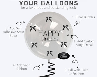 May include: A clear balloon with a black vinyl decal that says "HAPPY birthday". The balloon is decorated with black satin bows and has a black satin ribbon attached to the bottom. The balloon is filled with tulle or feathers.