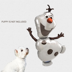 May include: A silver Olaf balloon with a smiling face, brown arms, and black spots. The text "PUPPY IS NOT INCLUDED" is visible. A white dog is looking up at the balloon.