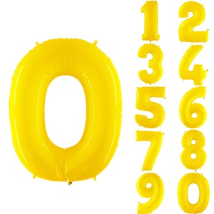 May include: A set of yellow balloon numbers, 0 through 9, for party decorations.