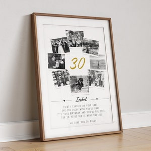 May include: A framed print with a wooden frame. The print features a collage of black and white photos surrounding the gold number "30". Below the photos is the name "Isobel" and a poem about turning thirty. The print is leaning against a white wall.