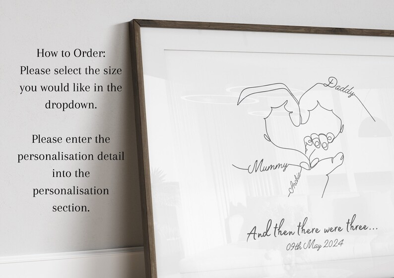 May include: A black and white line art print of two hands forming a heart shape with the words "Mummy", "Archie", and "Daddy" written underneath. The text "And then there were three... 09th May 2024" is at the bottom of the print.