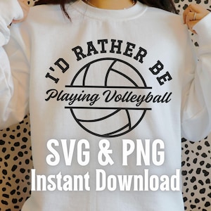Peut inclure: Sweat-shirt blanc avec un texte noir qui dit "I'd Rather Be Playing Volleyball" avec un graphique de volley-ball. Le texte "SVG & PNG Instant Download" est également imprimé sur le sweat-shirt.