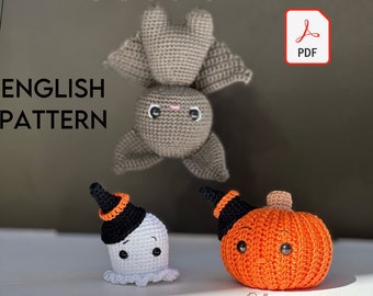May include: Crochet pattern for Halloween amigurumi toys. The pattern includes instructions for making a bat, a ghost, and a pumpkin. The pattern is available as a PDF download.  The text on the image reads "HALLOWEEN ENGLISH PATTERN".