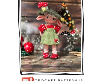 May include: A crocheted doll in a green dress with red accents, a mushroom hat, and red shoes. The doll has a whimsical design with a detailed crochet pattern. The image includes the text "CROCHET PATTERN IN ENGLISH".