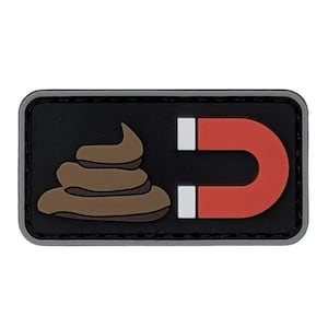 May include: A rectangular patch with a black background and a gray border. The patch features a brown poop emoji on the left and a red horseshoe magnet with white accents on the right. The design is a humorous play on words.