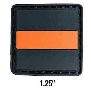 May include: A square patch with a black background and an orange horizontal stripe. The patch is 1.25 inches in size. The patch has a stitched border.
