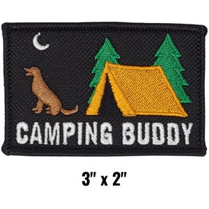 May include: Black rectangular patch with the words "CAMPING BUDDY" in white. The patch features a brown dog, a yellow tent, green trees, and a white crescent moon. The patch measures 3" x 2".
